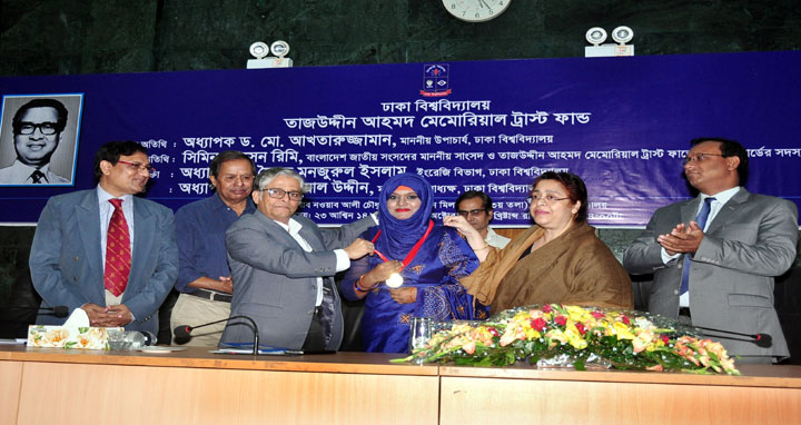 Dhaka University Vice-Chancellor Prof. Dr. Md. Akhtaruzzaman distributed Tajuddin Ahmad gold medal, scholarship and prizes among the students as chief guest at a function held today October 08, 2017 at Nabab Nawab Ali Chowdhury Senate Bhaban of the university. Tajuddin Ahmad Memorial Trust Fund of DU organized the program. Awardees are seen with the guests. (Picture- DU PR Office)