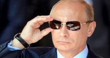 <font style='color:#000000'>Putin wins by big margin</font>